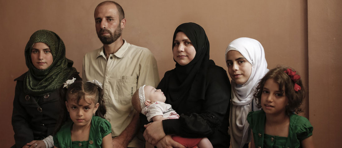 A Syrian refugee family in their home, Zarka, Jordan