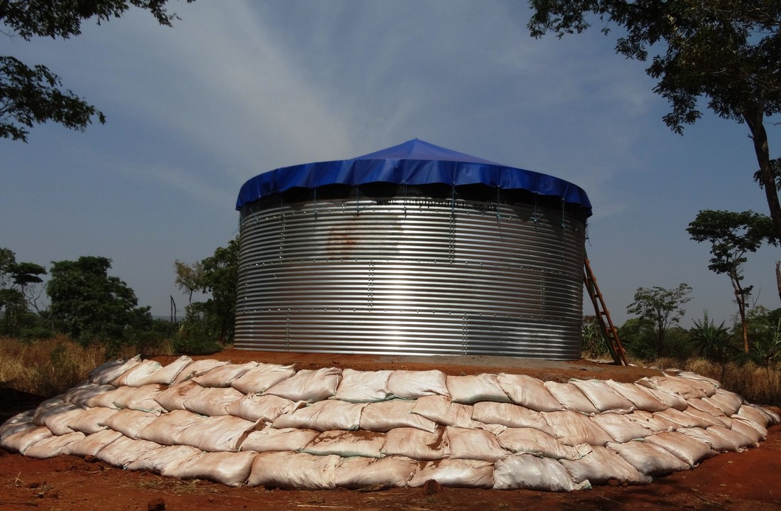 An Oxfam water tank under construction, Nduta camp, Tanzania