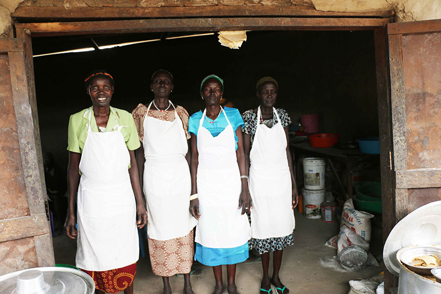 Staff members stand outside their restaurant in Rumbek, south Sudan