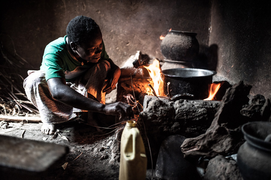 “When using firewood, I must stay close to the cooking stove to check over the fire", Christina says. Photo: Oxfam