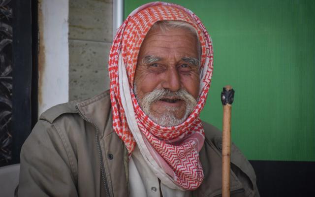 Munzer*, 71, is a farmer. He and 800 other families benefit from Oxfam’s cash assistance program in rural Aleppo, Syria. 