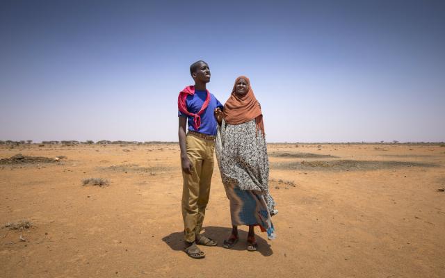 Dehabo Hassan Darror (right) with her mentally disabled grandson (left). Her wish and her dream is to build a house with a latrine, so she can take care about her grandson.
