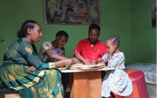 Achawach Berhanu with her family