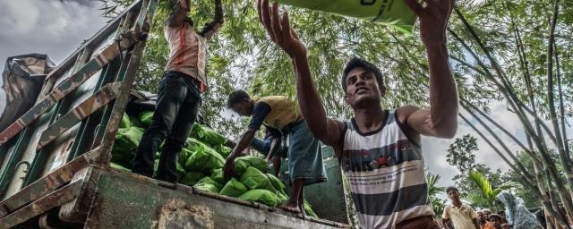 Oxfam's local partner Coast Trust helped to pack and load the food kits at Oxfam's warehouse in Cox Bazar. Credit:Tommy Trenchard / Oxfam