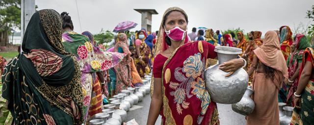 Romila, 35, walked miles to reach the water-distribution point in Burigoyalini.