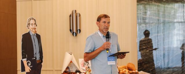   Oleksandr sharing the results of the shelter reconstruction during the forum organized by The Tenth of April in July. Photo provided by The Tenth of April