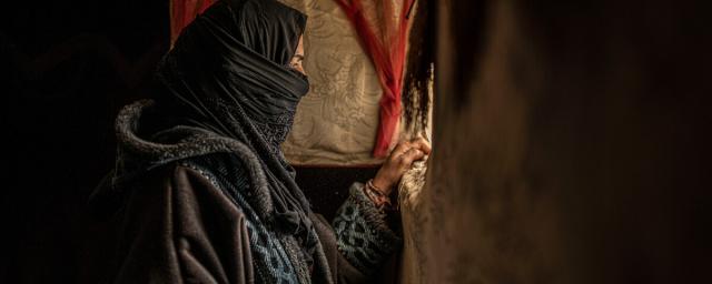 Amina lives with her children in a camp for Syrian refugees. When Israeli airstrikes began, she and others fled in terror.