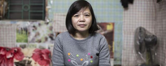 Hoan works at the Tinh Loi Garment Factory, in North Vietnam, where she works on average 62 hours each week, earning around $1 an hour, packaging t-shirts and shirts for global export. Photo: Adam Patterson/Oxfam