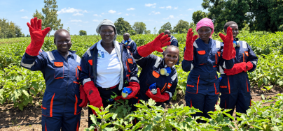 A group of women members from Kabo Farmers Group in Luri Payam, Juba County pose for a photo in their garden.