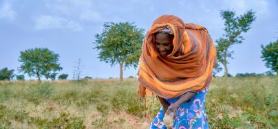 Satou Coulibaly, person with disability, now faces hunger in southern Mali. Because of irregular rainfall and drought, her millet and groundnuts are no longer growing as usual.